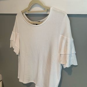 Generation Love: Lightly worn plain white t-shirt